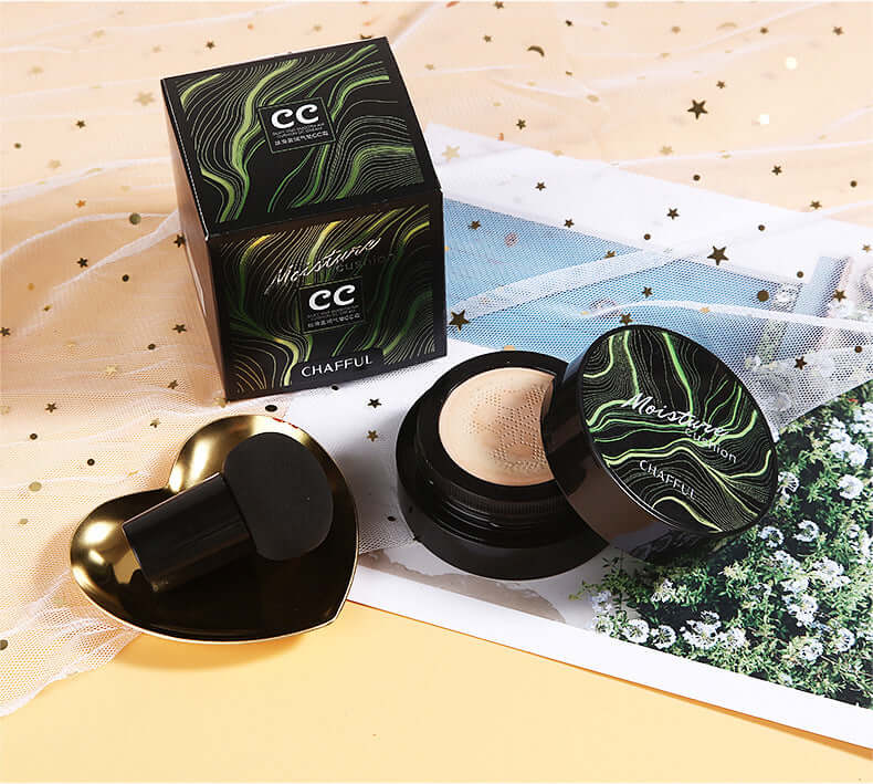 Air Cushion BB Cream in stylish packaging on a flat lay with heart-shaped applicator and decorative backdrop.